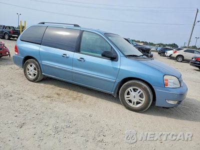 Czwarte zdjęcie samochodu z boku: 2007 FORD FREESTAR SEL VIN:2FMZA52237BA23616 - miniatura