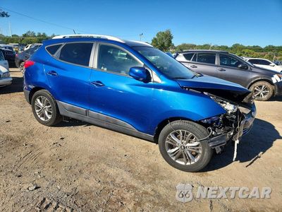 Czwarte zdjęcie samochodu z boku: 2014 HYUNDAI TUCSON SE VIN:KM8JU3AG1EU800596 - miniatura