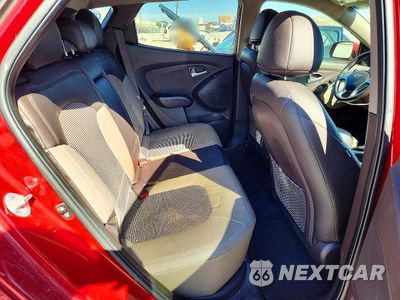 Zdjęcie 11 z 13 samochodu: 2012 HYUNDAI TUCSON GLS VIN:KM8JUCAC0CU374054 - miniatura