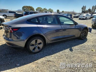 Trzecie zdjęcie samochodu z tyłu: 2023 TESLA MODEL 3 VIN:5YJ3E1EA5PF707581 - miniatura