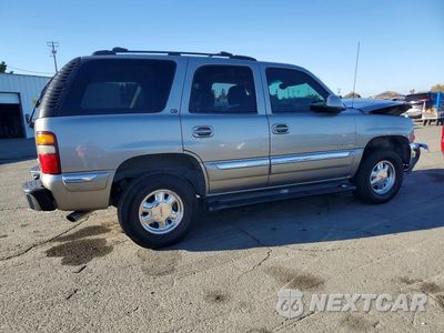 Trzecie zdjęcie samochodu z tyłu: 2002 GMC YUKON VIN:1GKEC13T52R137429 - miniatura