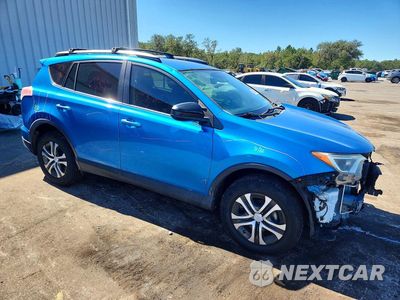 Czwarte zdjęcie samochodu z boku: 2017 TOYOTA RAV4 LE VIN:JTMZFREV9HJ132033 - miniatura