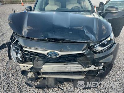 Zdjęcie 12 z 14 samochodu: 2021 TOYOTA HIGHLANDER HYBRID XLE VIN:5TDHARAHXMS012023 - miniatura