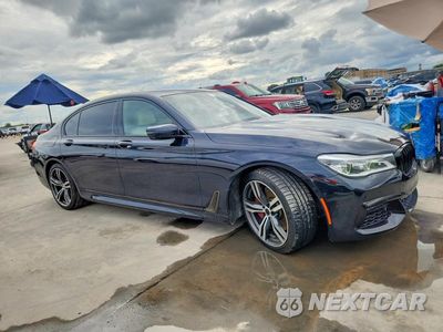 Czwarte zdjęcie samochodu z boku: 2016 BMW 750 XI VIN:WBA7F2C51GG417433 - miniatura