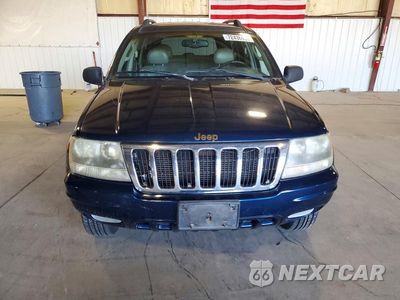 Piąte zdjęcie samochodu w środku: 2002 JEEP GRAND CHEROKEE LAREDO VIN:1J8GW48S52C270202 - miniatura