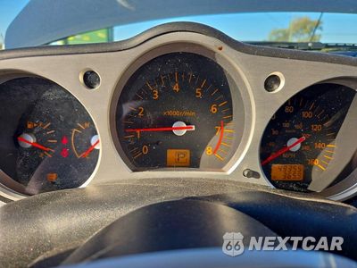 Zdjęcie 9 z 12 samochodu: 2004 NISSAN 350Z BASE VIN:JN1AZ34D54M100363 - miniatura