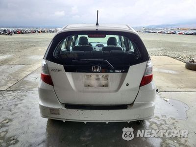 Zdjęcie 6 z 12 samochodu: 2009 HONDA FIT VIN:JHMGE88209S070747 - miniatura