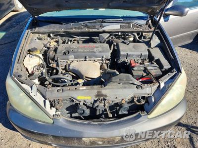 Zdjęcie 11 z 12 samochodu: 2004 TOYOTA CAMRY LE VIN:4T1BE32K34U833151 - miniatura