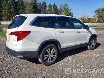 Trzecie zdjęcie samochodu z tyłu: 2017 HONDA PILOT EX VIN:5FNYF6H33HB077896 - miniatura