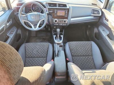 Zdjęcie 8 z 13 samochodu: 2016 HONDA FIT LX VIN:JHMGK5H57GX026603 - miniatura