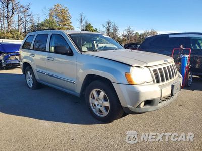 Czwarte zdjęcie samochodu z boku: 2010 JEEP GRAND CHEROKEE LAREDO VIN:1J4PR4GK9AC104967 - miniatura