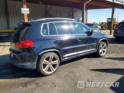 Trzecie zdjęcie samochodu z tyłu: 2014 VOLKSWAGEN TIGUAN S VIN:WVGBV3AX6EW059142 - miniatura