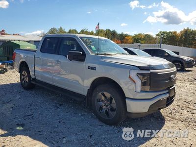 Czwarte zdjęcie samochodu z boku: 2024 FORD F150 LIGHTNING XLT VIN:1FT6W3L75RWG02518 - miniatura