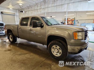 Czwarte zdjęcie samochodu z boku: 2009 GMC SIERRA K2500 SLT VIN:1GTHK63679F174660 - miniatura