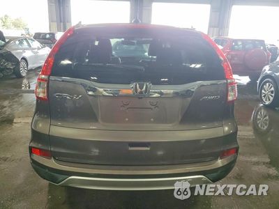 Zdjęcie 6 z 12 samochodu: 2015 HONDA CR-V EXL VIN:2HKRM4H70FH653637 - miniatura