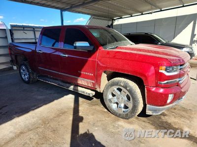 Czwarte zdjęcie samochodu z boku: 2018 CHEVROLET SILVERADO K1500 LTZ VIN:3GCUKSEC4JG548705 - miniatura
