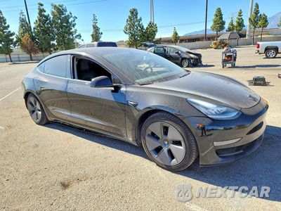 Czwarte zdjęcie samochodu z boku: 2019 TESLA MODEL 3 VIN:5YJ3E1EA0KF415717 - miniatura