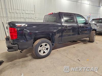 Trzecie zdjęcie samochodu z tyłu: 2018 CHEVROLET SILVERADO K1500 LT VIN:3GCUKREC7JG135217 - miniatura