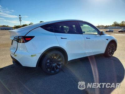 Trzecie zdjęcie samochodu z tyłu: 2022 TESLA MODEL Y VIN:7SAYGDEEXNA017245 - miniatura
