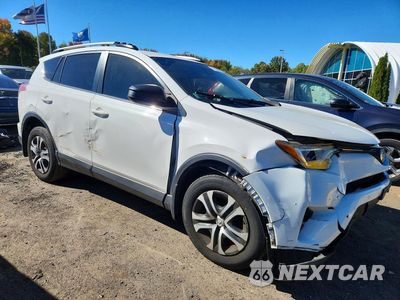 Czwarte zdjęcie samochodu z boku: 2017 TOYOTA RAV4 LE VIN:JTMBFREV6HJ109522 - miniatura