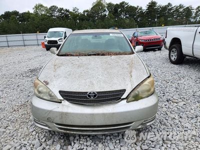 Piąte zdjęcie samochodu w środku: 2002 TOYOTA CAMRY LE VIN:4T1BE32K92U005201 - miniatura