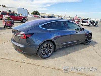Trzecie zdjęcie samochodu z tyłu: 2017 TESLA MODEL 3 VIN:5YJ3E1EA9HF000663 - miniatura