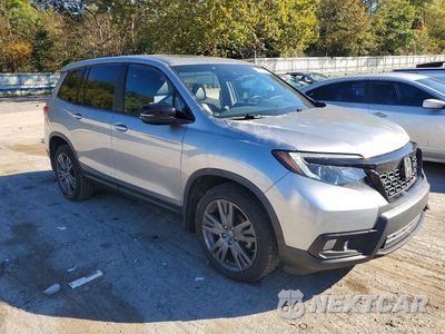 Czwarte zdjęcie samochodu z boku: 2020 HONDA PASSPORT EXL VIN:5FNYF8H54LB001299 - miniatura