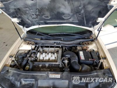 Zdjęcie 11 z 12 samochodu: 1998 LINCOLN CONTINENTAL VIN:1LNFM97V9WY662508 - miniatura