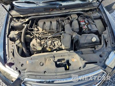 Zdjęcie 11 z 12 samochodu: 2014 FORD TAURUS SEL VIN:1FAHP2E8XEG121440 - miniatura