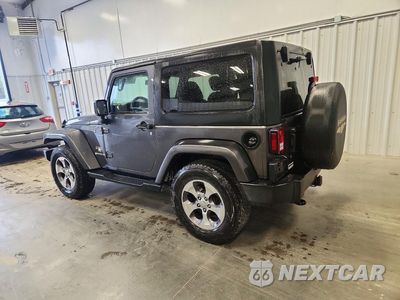 Drugie zdjęcie samochodu z przodu: 2016 JEEP WRANGLER SAHARA VIN:1C4AJWBG4GL203559 - miniatura