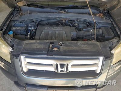 Zdjęcie 12 z 13 samochodu: 2006 HONDA PILOT EX VIN:2HKYF18466H563967 - miniatura
