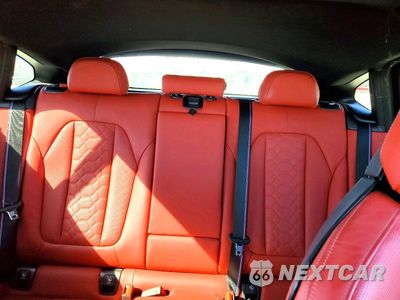 Zdjęcie 10 z 14 samochodu: 2024 BMW X4 M VIN:5YM23EC08R9U69846 - miniatura
