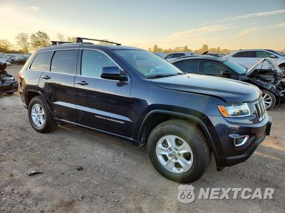 Czwarte zdjęcie samochodu z boku: 2014 JEEP GRAND CHEROKEE LAREDO VIN:1C4RJFAG9EC163304 - miniatura