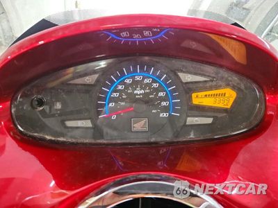 Zdjęcie 7 z 9 samochodu: 2013 HONDA PCX 150 VIN:MLHKF1217D5008024 - miniatura
