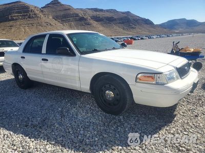 Czwarte zdjęcie samochodu z boku: 2011 FORD CROWN VICTORIA POLICE INTERCEPTOR VIN:2FABP7BV7BX152065 - miniatura
