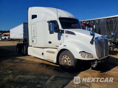 Czwarte zdjęcie samochodu z boku: 2021 KENWORTH CONSTRUCTION T680 VIN:1XKYDP9X8MJ439385 - miniatura