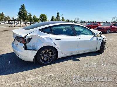 Trzecie zdjęcie samochodu z tyłu: 2023 TESLA MODEL 3 VIN:5YJ3E1EA5PF563076 - miniatura