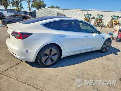 Trzecie zdjęcie samochodu z tyłu: 2018 TESLA MODEL 3 VIN:5YJ3E1EA7JF162684 - miniatura