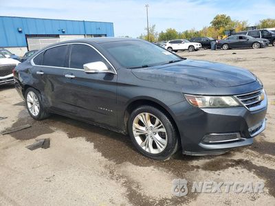 Czwarte zdjęcie samochodu z boku: 2014 CHEVROLET IMPALA LT VIN:1G1115SL2EU101457 - miniatura
