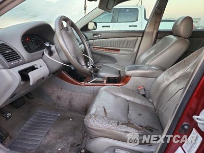 Zdjęcie 7 z 12 samochodu: 2003 TOYOTA CAMRY XLE V6 VIN:JTDBF30K730096059 - miniatura