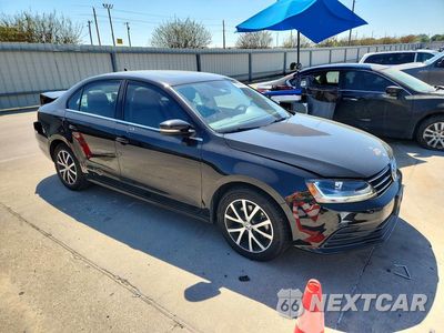 Czwarte zdjęcie samochodu z boku: 2017 VOLKSWAGEN JETTA SE VIN:3VWDB7AJ2HM355916 - miniatura