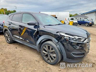 Czwarte zdjęcie samochodu z boku: 2018 HYUNDAI TUCSON SE VIN:KM8J2CA40JU819937 - miniatura