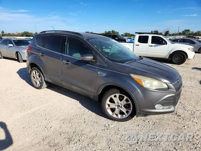 Czwarte zdjęcie samochodu z boku: 2013 FORD ESCAPE SE VIN:1FMCU0G94DUC54486 - miniatura