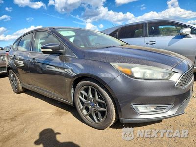 Czwarte zdjęcie samochodu z boku: 2016 FORD FOCUS SE VIN:1FADP3K29GL332935 - miniatura