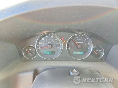 Zdjęcie 9 z 13 samochodu: 2007 JEEP COMMANDER LIMITED VIN:1J8HG58NX7C595582 - miniatura