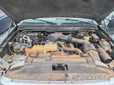 Zdjęcie 12 z 13 samochodu: 2000 FORD EXCURSION LIMITED VIN:1FMNU42SXYED11297 - miniatura