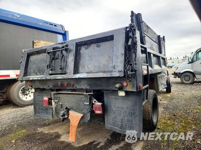 Trzecie zdjęcie samochodu z tyłu: 2012 FORD F550 SUPER DUTY DUMP TRUCK VIN:1FDUF5HT5CEA93600 - miniatura
