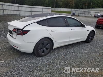 Trzecie zdjęcie samochodu z tyłu: 2023 TESLA MODEL 3 VIN:5YJ3E1EA4PF493523 - miniatura