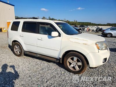 Czwarte zdjęcie samochodu z boku: 2011 HONDA PILOT EXL VIN:5FNYF4H54BB085616 - miniatura