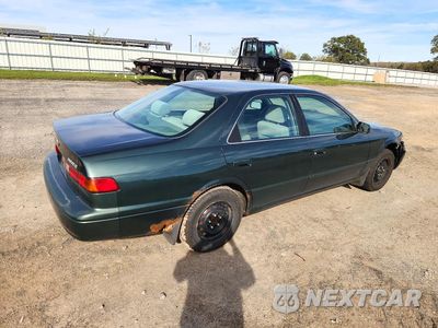 Trzecie zdjęcie samochodu z tyłu: 1999 TOYOTA CAMRY LE VIN:4T1BG22K4XU899894 - miniatura
